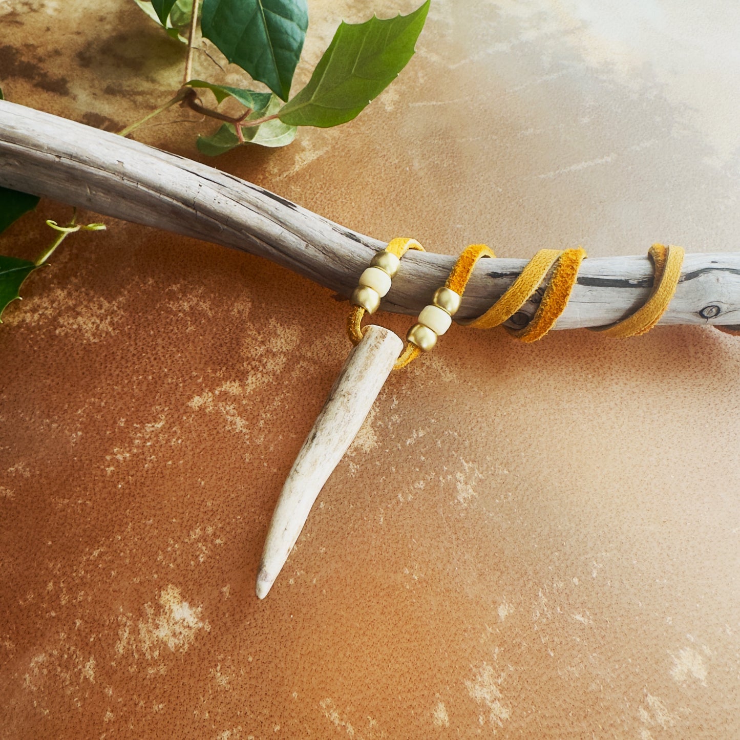 Indigenous deer antler necklace symbolizing balance with genuine moose leather