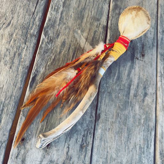 Ceremonial rattle made of driftwood and precious materials