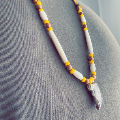 Necklace inspired by bear medicine, crafted with warm brown materials