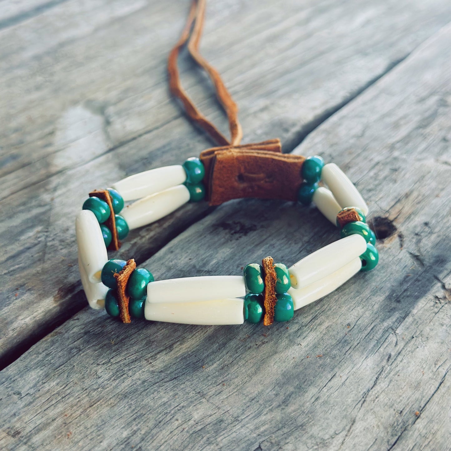 Handmade bone bead bracelet with genuine moose leather, minimalist Indigenous jewelry