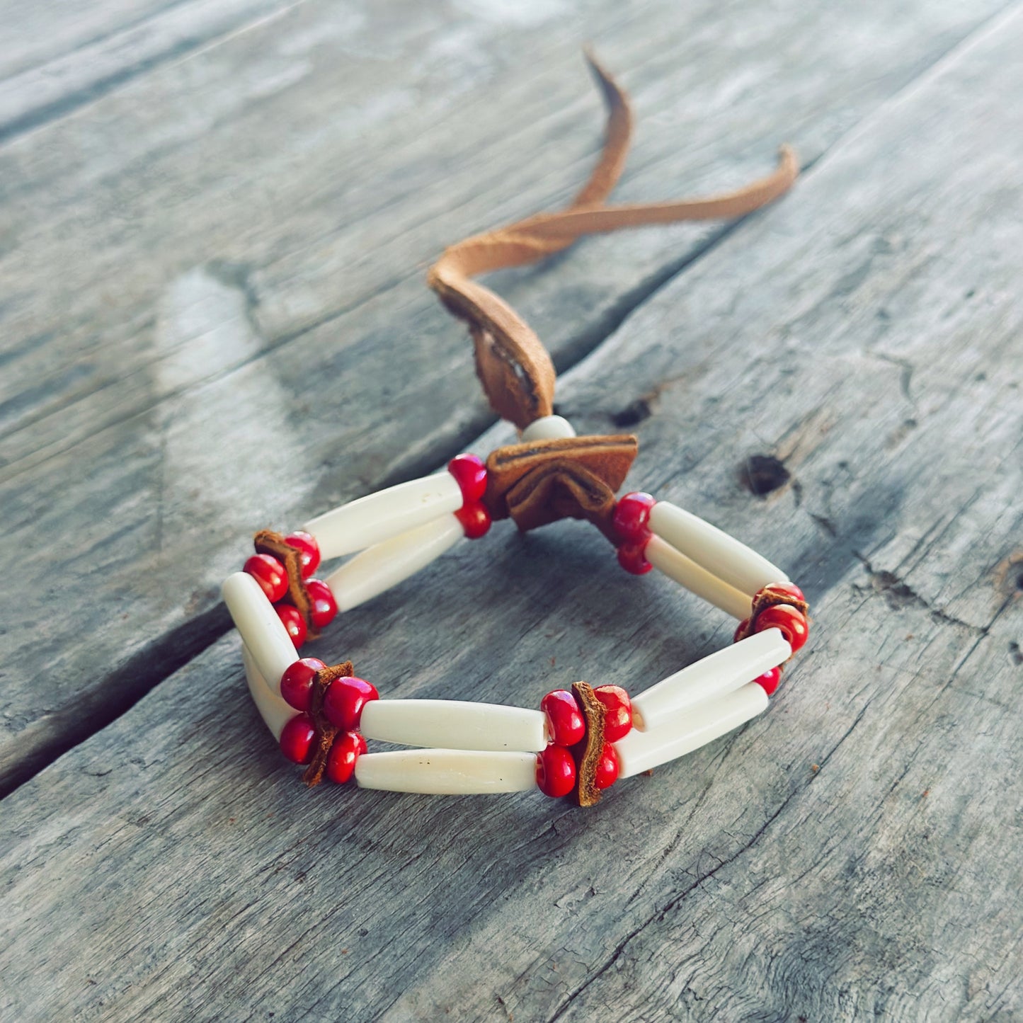 Handmade bone and red glass bead double strand bracelet with genuine moose leather, Indigenous artisan jewelry
