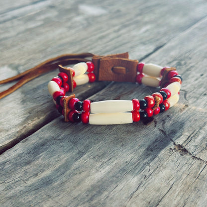 Handmade bone and red glass bead bracelet with genuine moose leather, strength inspired Indigenous jewelry
