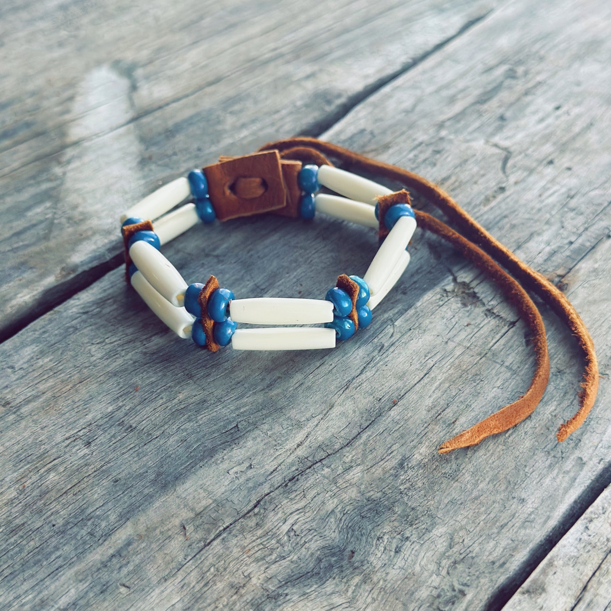 Handmade bone and blue glass bead bracelet with genuine moose leather, calming Indigenous bracelet
