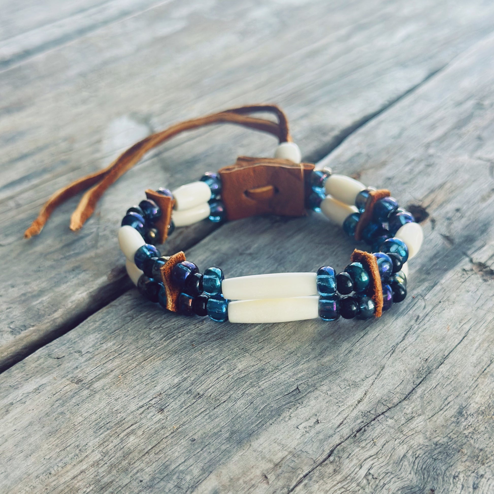 Handmade bone and blue glass bead bracelet with genuine moose leather, calming Indigenous jewelry