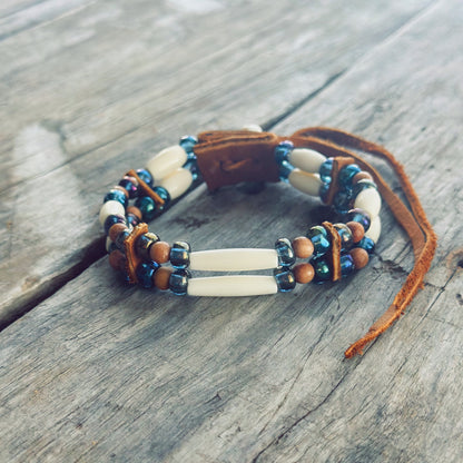 Handmade bone and green glass bead bracelet with genuine moose leather, nature inspired Indigenous jewelry