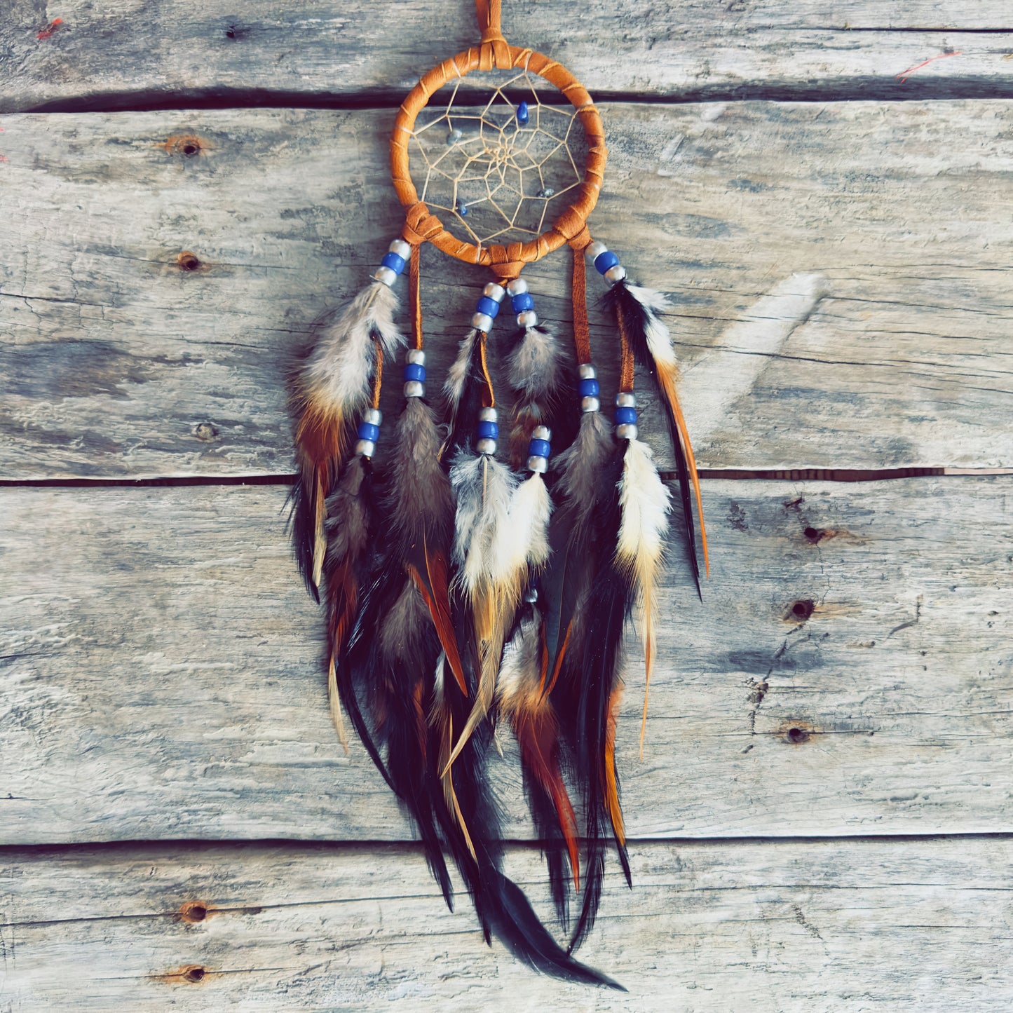 Handcrafted Indigenous dreamcatcher made with natural materials by an Indigenous artisan