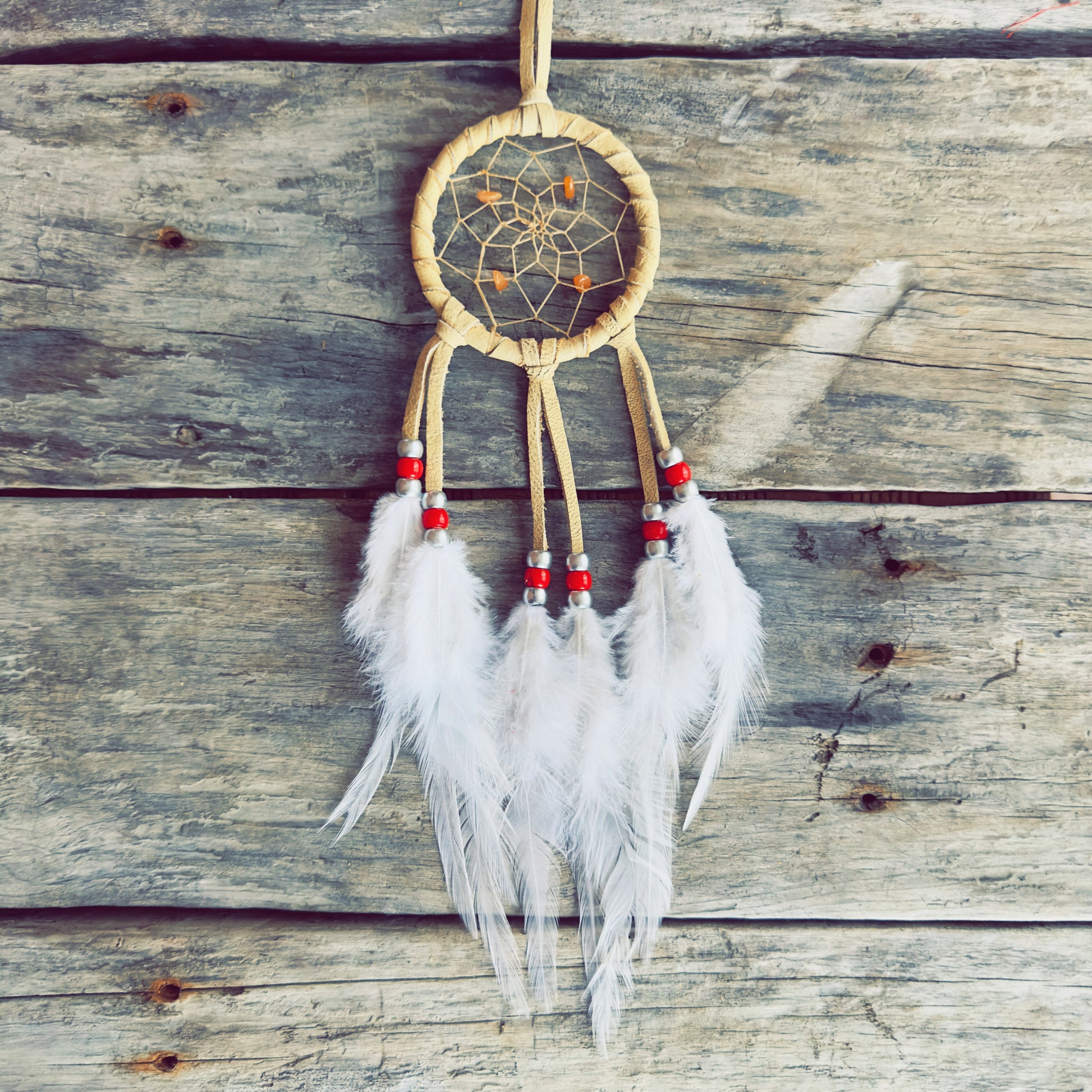 Indigenous ceremonial dreamcatcher handcrafted for spiritual balance and protection