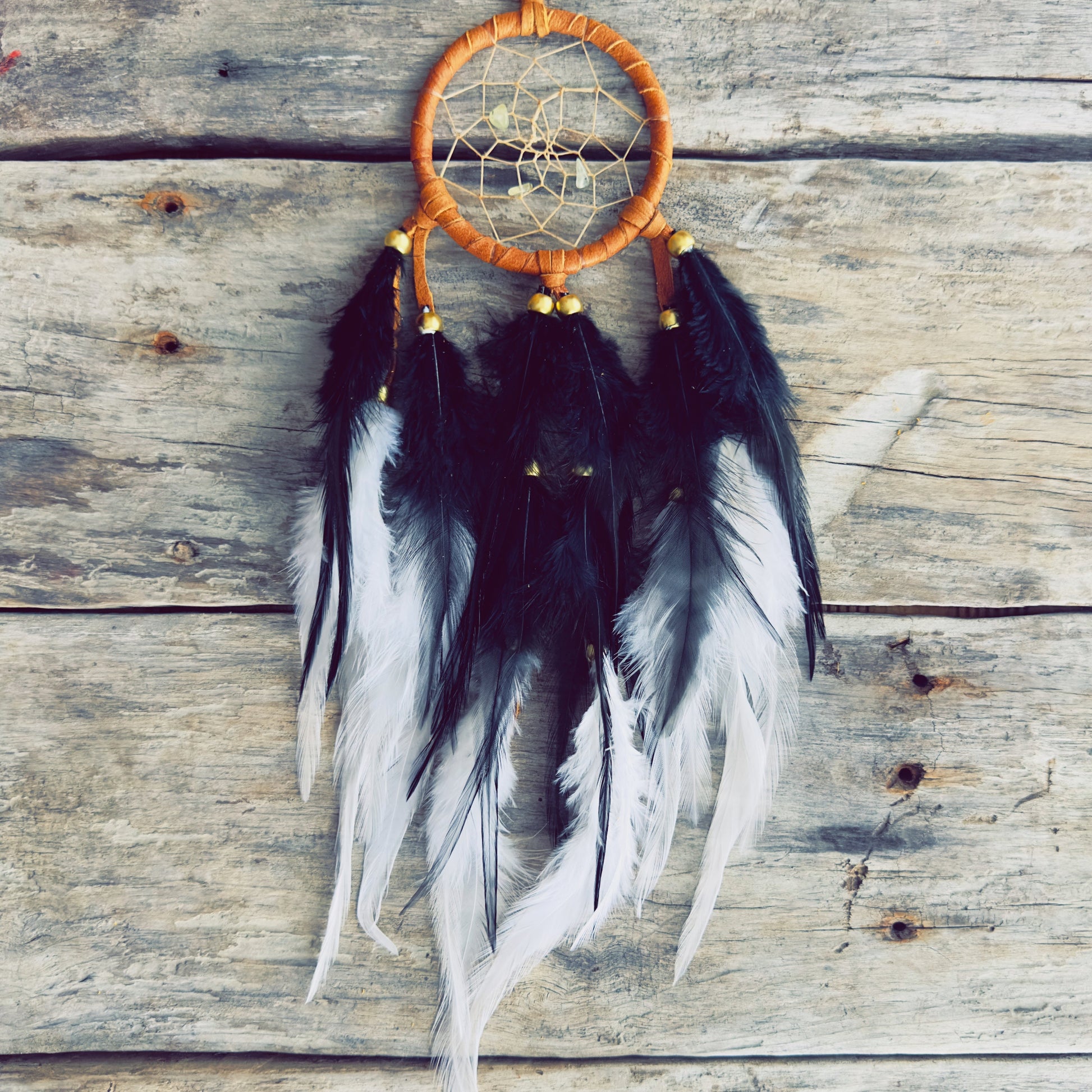 Boreal style dreamcatcher with natural feathers