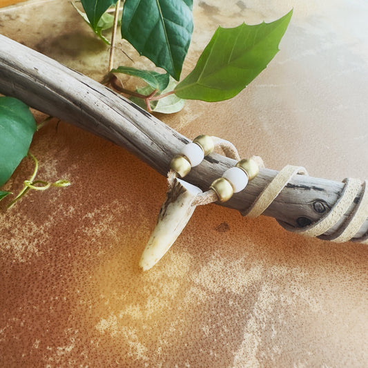 Unique Indigenous necklace made with natural deer antler and moose leather