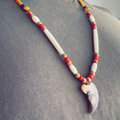 Earth-tone Indigenous necklace with natural beads and cultural influence