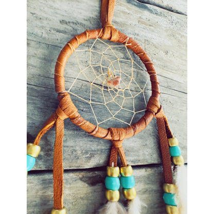 Dreamcatcher reflecting Native symbolism, representing harmony, wisdom, and the circle of life in spiritual tradition.