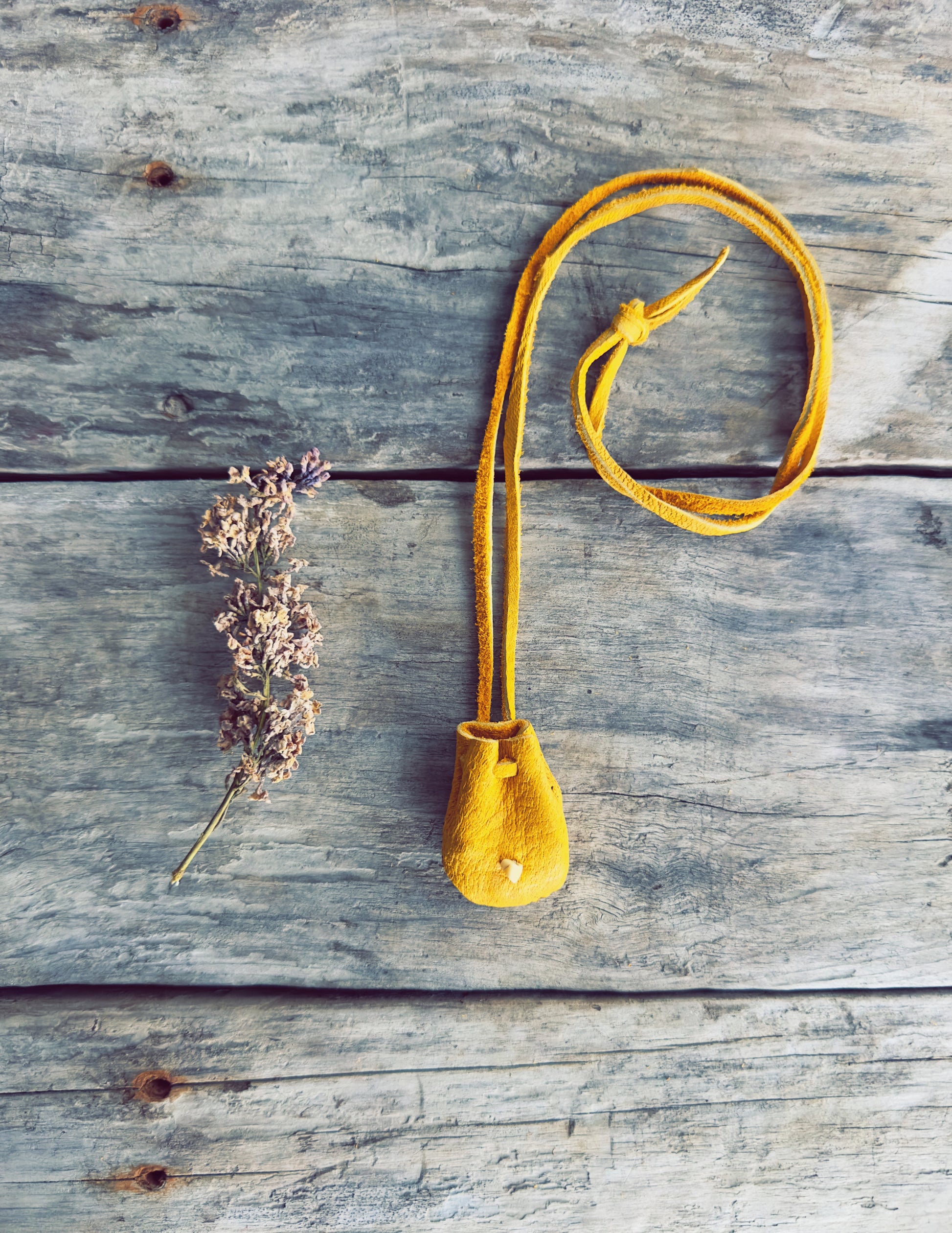 Handcrafted medicine pouch inspired by Indigenous traditions with leather